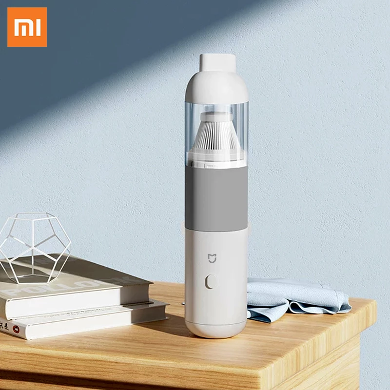 Xiaomi Portable Car Vacuum Cleaner, home, car, dual-purpose design, nozzle attachments, wet messes, dry debris, rechargeable, wireless, mini, handheld, powerful suction, tight spaces, control, precision